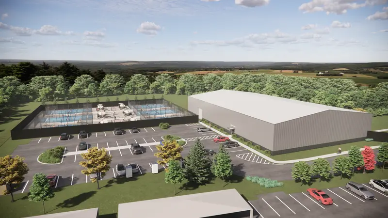 Aerial rendering of the club building, outdoor courts, and parking